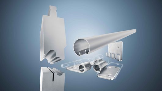 3D display of metal bending dies and tools for sheet metal processing against a blue-green background